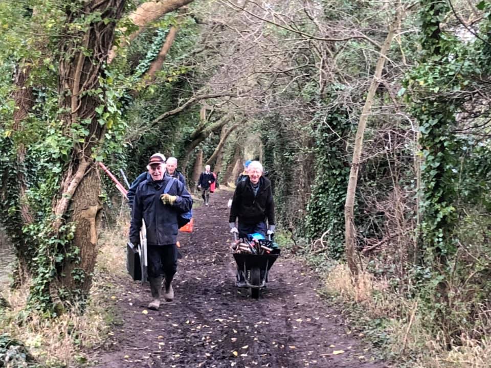 East Vale work party heading along Stockham section to find and mend a leak